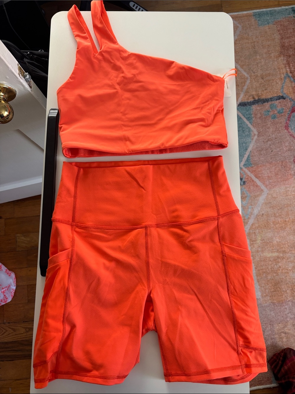 Fabletics Orange Asymmetrical Double-Strap Midi Bra and biker shorts SET